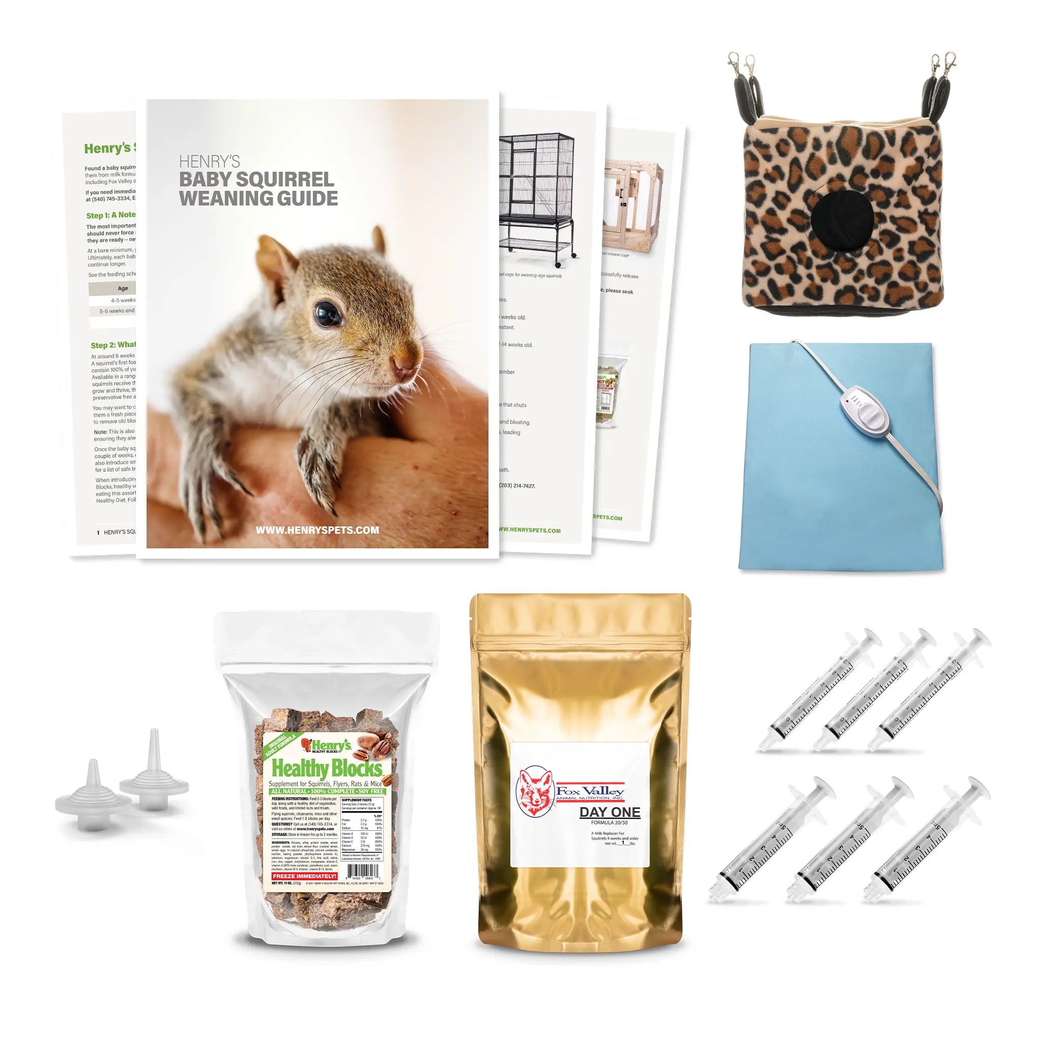 Composite image of everything included in a Complete Fox Valley Weaning Kit: Weaning Guide, Fox Valley 20/50 Formula, Healthy Blocks, Small and Medium Easy-Grip Nipples, three 3 mL and three 5 mL syringes, heating pad, and Cozy Cube.