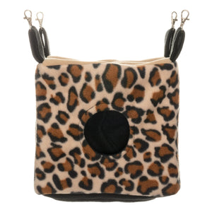 Image of Cozy Cube with all four straps raised as if hanging up in use.