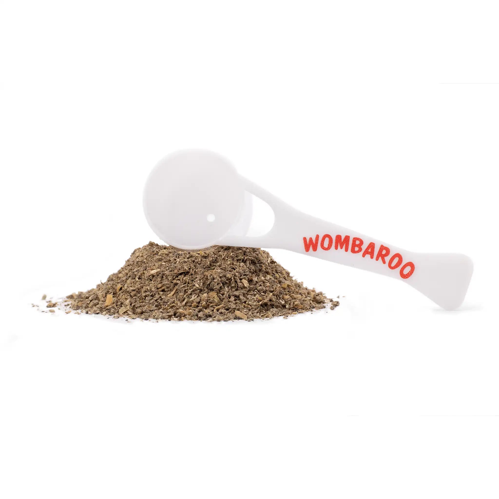 Image of Wombaroo Herbivorous Reptile Meal spread out on a white background, backed by a Wombaroo-branded scoop that comes with your purchase.
